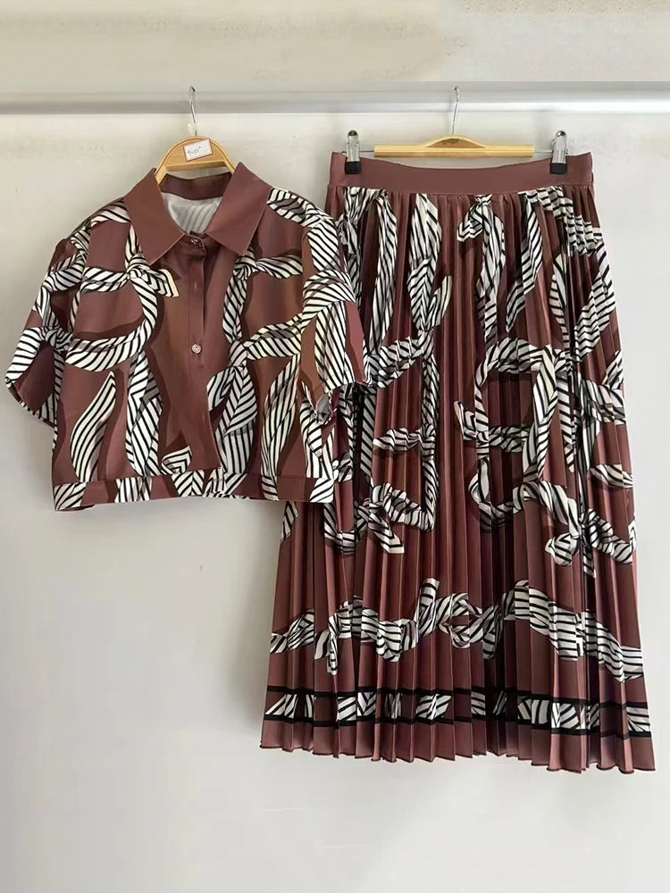 Retro geometric print lapel short shirt two-piece set 2026 summer women's clothing + loose large size pleated skirt fashion suit