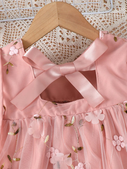 Baby girl flower embroidered mesh dress with bow tie and strap design, suitable for spring and summer when paired with a bag