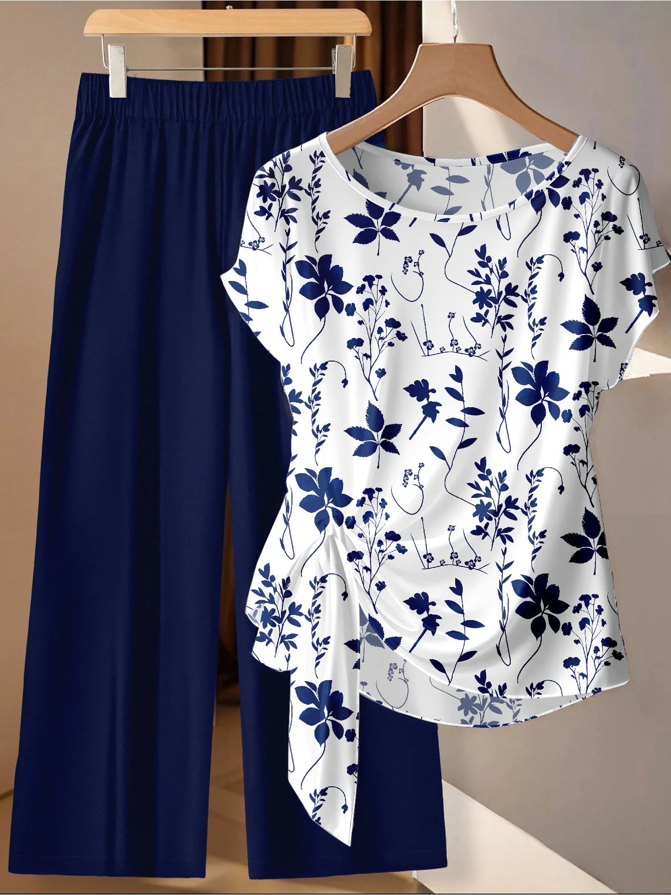 Summer Comfortable and Casual Women's Plus Size White Plant Pattern Twisted Top, Navy Blue Wide Leg Pants Set, Two-Piece Set
