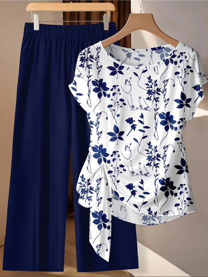 Summer Comfortable and Casual Women's Plus Size White Plant Pattern Twisted Top, Navy Blue Wide Leg Pants Set, Two-Piece Set