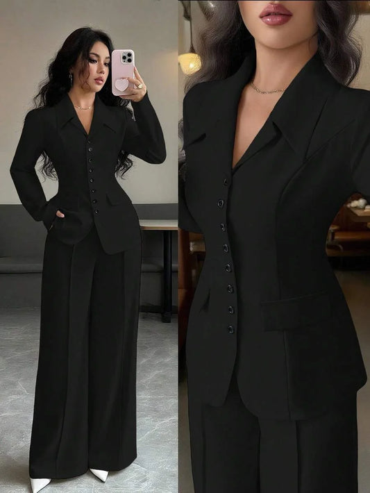 Solid-color button-down front shirt. Casual drop-shoulder long-sleeve top paired with trousers. A women's casual set suitable fo