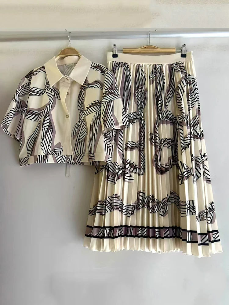 Retro geometric print lapel short shirt two-piece set 2026 summer women's clothing + loose large size pleated skirt fashion suit