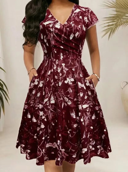 Elegant floral and printed V-neck mid-length pocket dresses for spring, summer and autumn, made of polyester blends