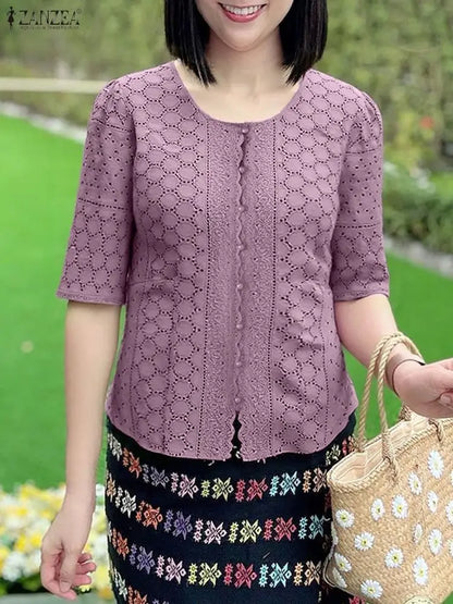 ZANZEA Elegant Openwork Embroidered Shirts Women Fashion O-Neck Half Sleeve Wavecut Placket Solid Color Blouses Hollow Out Tops