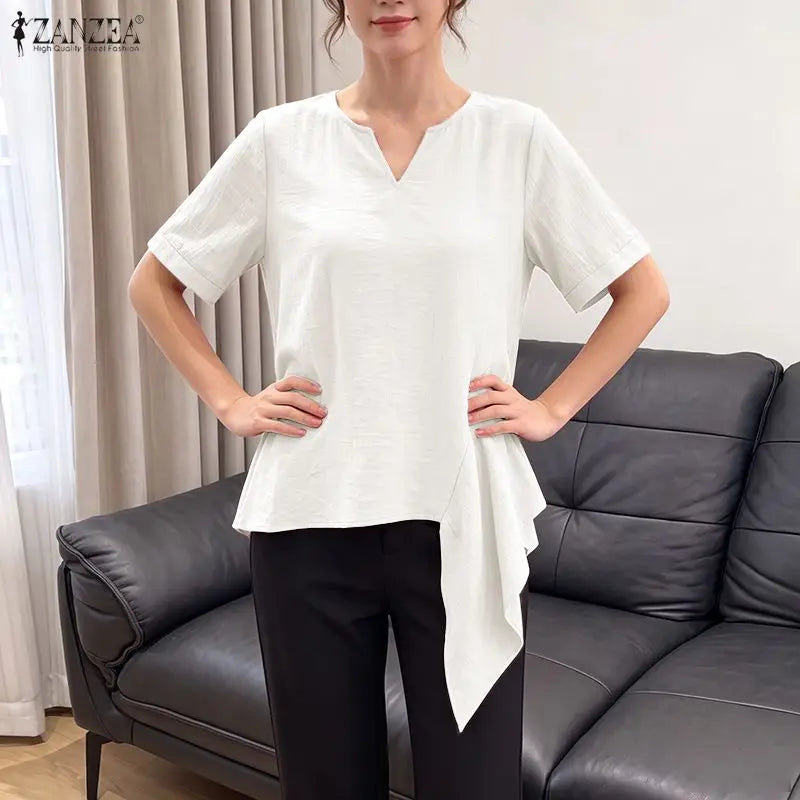 ZANZEA 2026 Woman Crinkled Fabric Asymmetrical Hem Blouses V-Neck Short Sleeve Solid Tops Summer Casual Daily Wear Blusas Mujer
