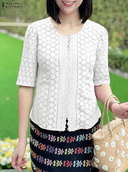 ZANZEA Elegant Openwork Embroidered Shirts Women Fashion O-Neck Half Sleeve Wavecut Placket Solid Color Blouses Hollow Out Tops