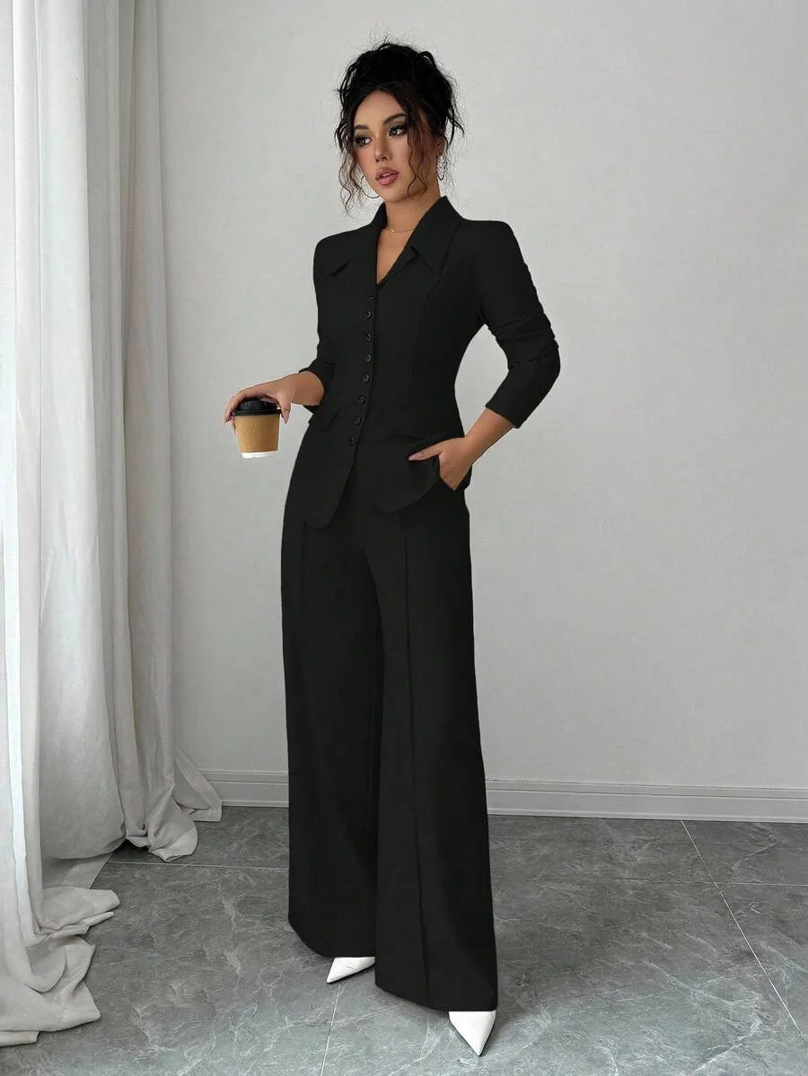 Solid-color button-down front shirt. Casual drop-shoulder long-sleeve top paired with trousers. A women's casual set suitable fo