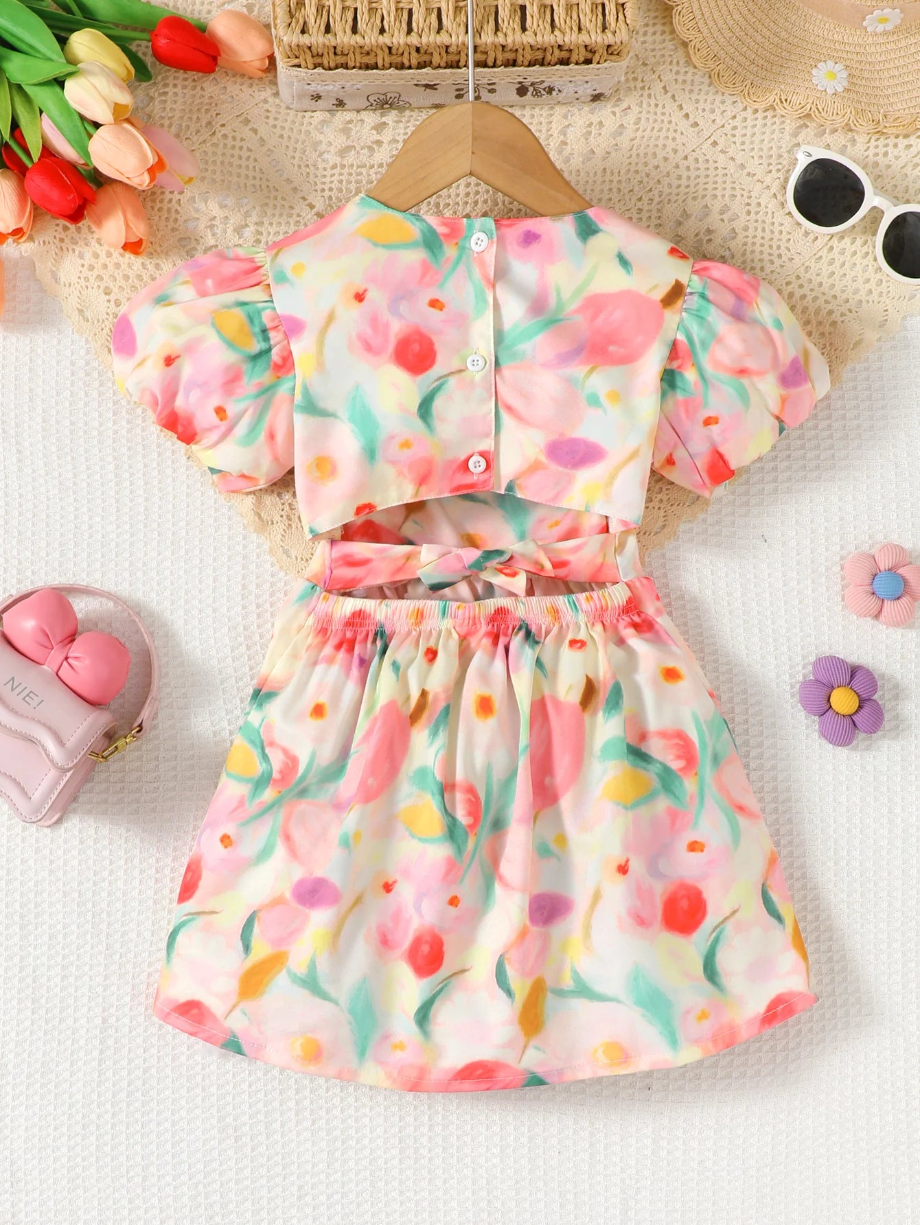 Girls' floral printed bubble sleeve square neck dress with backless straps and bow, suitable for outdoor wear in spring/summer