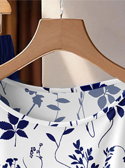 Summer Comfortable and Casual Women's Plus Size White Plant Pattern Twisted Top, Navy Blue Wide Leg Pants Set, Two-Piece Set